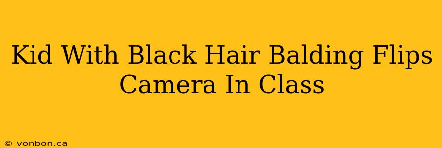 Kid With Black Hair Balding Flips Camera In Class